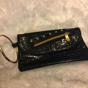 Blk/gold clutch w/bangle holder.